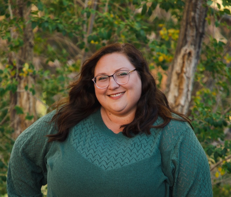 Heather Fuller, founder of Pathway Christian Academy, smiling outdoors